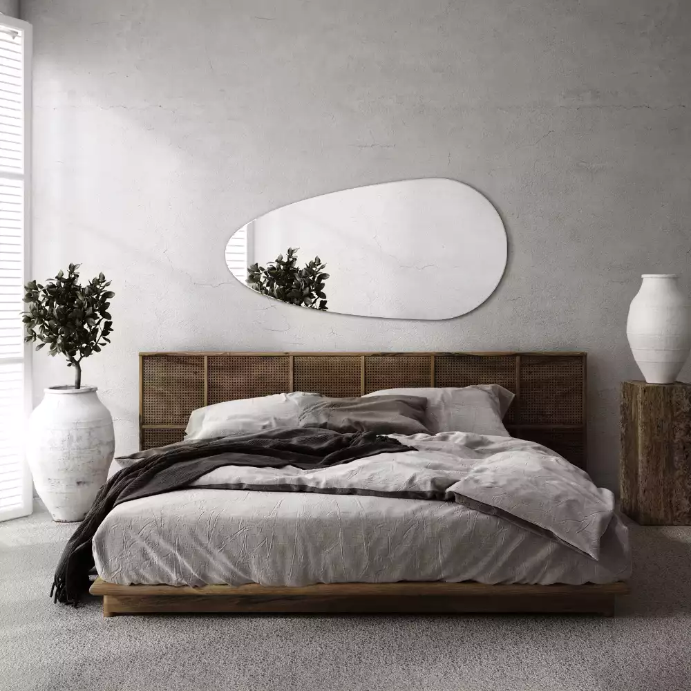 Lustro w kształcie nieregularnej kropli do zawieszenia na ścianie