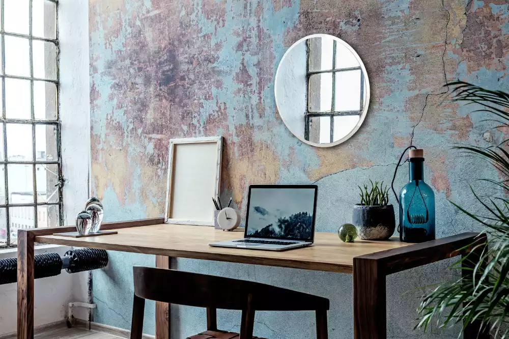 Okrągłe lustro wiszące w białej ramie