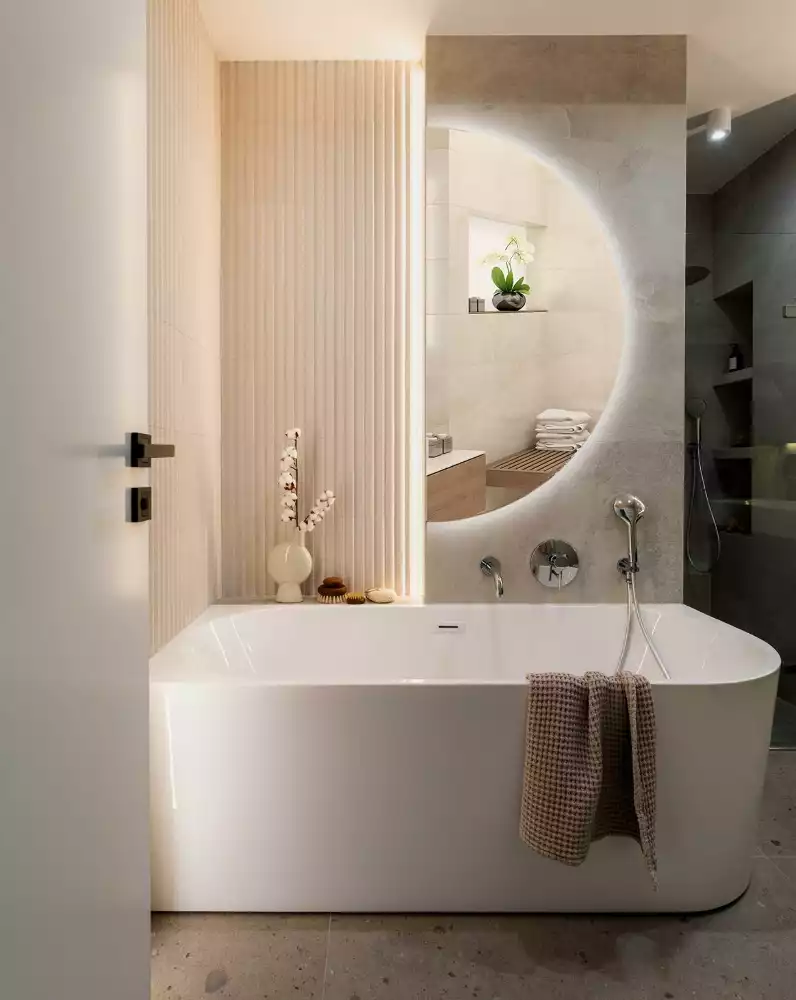 Lustro w kształcie połowy koła z podświetleniem LED jako stylowy dodatek